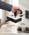 Asixxsix Electric Wire Puller For Narrow Conduit and Residential Wiring Projects in use, showing cable pulling from wall.