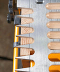 Close-up of a 12 Inch Dovetail Jig With Templates, Router Bits, And Guide Bushing For Half Blind And Through Dovetails, Box Joints