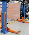 Heavy Duty Portable Two Post Car Lift With 8000 Lbs Capacity And Electric Lock Adjustable Height Up To 51 Inches view in workshop setting.
