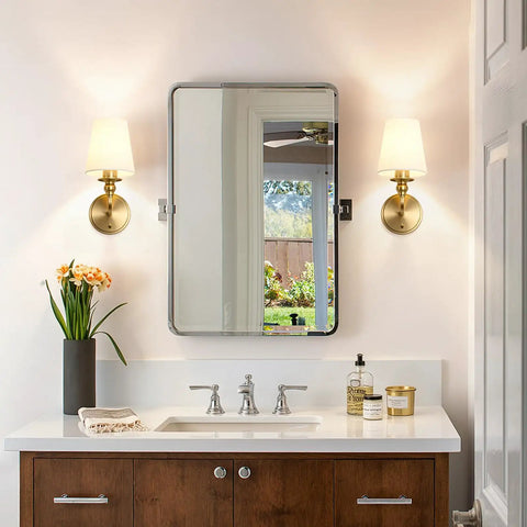 Onwecen Wall Sconces Set of 2, Modern Bathroom Light Fixtures, Brushed Gold flanking a mirror above a bathroom sink.