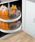 Two-pack metal Lazy Susan baskets installed in white circular corner cabinet turntable; black wire, 9x6.2x4 in