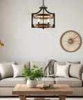 Farmhouse 3-Light Industrial Pendant Light With Wood And Metal Drum Shade hanging over cozy living room