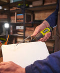 A person using a 4V Cordless Hot Foam Cutter With 2.0Ah Battery for model making, shaping foam efficiently.