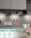No-Fuss 12 Inch Under Cabinet Lights With 47 LEDs, Motion Sensor installed under kitchen cabinets with remote control usage.