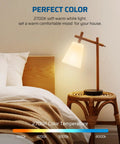 Bedroom lamp casting 2700K warm white light, showcasing Four Pack A19 Dimmable LED Light Bulbs, 2700K Warm White, 800 Lumens