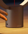 Close-up of a person using the touch dimmer on the Balance Lamp For Bedroom And Nightstand With Touch Dimmer, Rechargeable LED Table Lamp