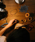 Image of hands using tools with a pile of Hardcore Carbon Steel Mini Wood Screws Deep Thread Fasteners Furniture Hardware Kit.