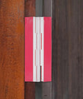 Self Adhesive Acrylic Hinges Pack Flush Mini Cabinet Hinges With Strong Double Sided Adhesive mounted on wood surface