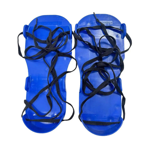 Top view of blue heavy duty adjustable lawn aerator shoes with spike soles for no fuss lawn care, yard work, and patio maintenance.