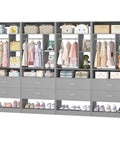 Freestanding 8Ft Closet System With Smooth Rolling Casters And Four Roomy Wood Drawers showcasing organized children's clothes and toys.