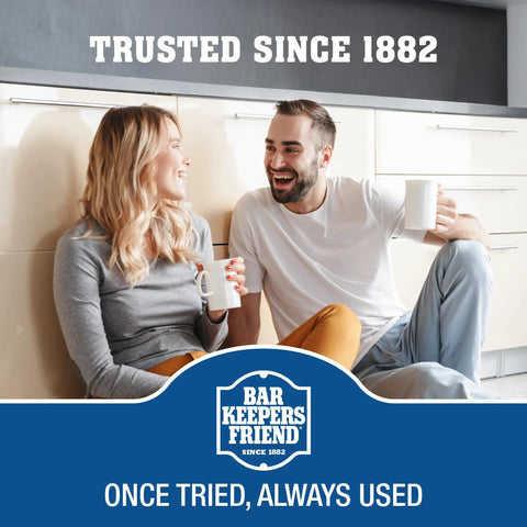 Two people sitting on a kitchen floor holding mugs, with text 'Trusted Since 1882' and 'Bar Keepers Friend' logo visible.