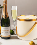 3L Double Wall Insulated Stainless Steel Ice Bucket With Scoop For Cocktails And Bar Parties next to champagne bottle