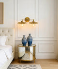 Bedroom with Two Light Industrial Metal Wall Sconces With Antique Brass Flower Ripple Shade