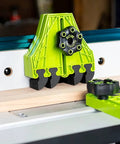 BOW FencePRO FP4 featherboard with lime green EVA fingers mounted on a blue table/router fence