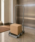 Open-Frame Hand Push Trolley With Low-Profile Base, Upright Handle, No-Fuss Easy-Roll Cart For Quick Hauls, Lightweight Utility Hand Cart For Warehouse, Shop, And Home Use beside box