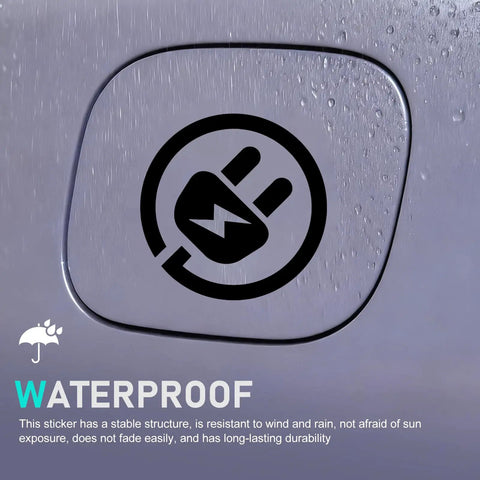 Badass Waterproof Reflective EV Charging Port Sticker Black Electric Plug Vinyl Decal visible on wet surface highlighting waterproof feature.