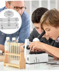 Young students using a microscope with inset of Twenty Pack Spring Water Stop Clip Tubing Clamps For Lab Flow Control And Leakproof Pro Grade Scientific Experiments Ideal For Research And Teaching Labs Medical And Industrial Applications.