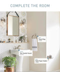 Spot Resistant Brushed Nickel Two-Handle 4-Inch Centerset Bathroom Faucet for 3-Hole Sinks with Aerated Water featured in a modern bathroom.