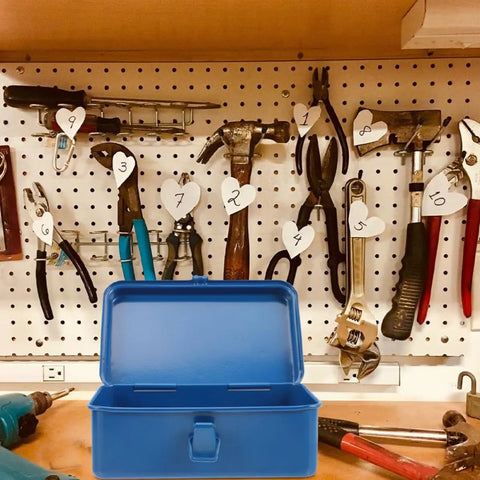 Heavy Duty Metal Tool Box Pair In Blue Thick Iron Construction With Sturdy Latches Portable Trunk Storage For Your Ride Or Home Workshop Solid Setup on a workbench.