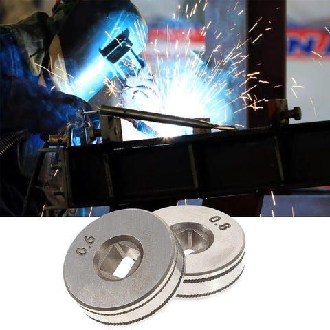 Close-up of two silver knurled wire feed drive rollers (0.6/0.8 mm) for SSJ16 MIG wire feeder.