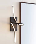 Nine Inch Black Sleek Modern Minimalist Integrated LED Vanity Light Sconce Dimmable Metal Wall Lamp beside mirror