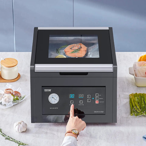 User operating Chamber Vacuum Sealer 380W Pump Power for Home Kitchen, 90 Liters Per Minute Air Removal with salmon inside