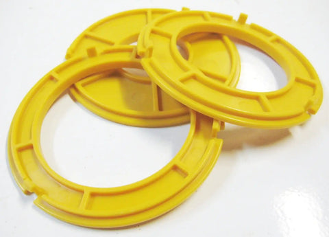 No Sweat Router Table Insert Rings 3 Inch Outside Diameter For Classic Shop Tables Easy Swap Badass Steel Build Perfect Upgrade Knockout Tough Woodworking Replacement Parts in yellow plastic.