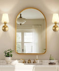 Onwecen Wall Sconces Set of 2, Modern Bathroom Light Fixtures, Brushed Gold beside a round mirror in a stylish bathroom.