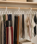 Slick Closet Organizer And Scarf Hanger That Crushes Your Morning Clutter With Wide Loops For Quick Belt Tie And Hijab Storage A Total No Sweat Daily Essential And Big Time Gift - showing multiple scarves and belts organized neatly.