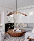 33.4" Large Wood Pendant Lights, Mid-Century Modern Natural Black Walnut Wood Pendant Light Fixture above a cozy living room.