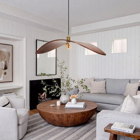 33.4" Large Wood Pendant Lights, Mid-Century Modern Natural Black Walnut Wood Pendant Light Fixture above a cozy living room.