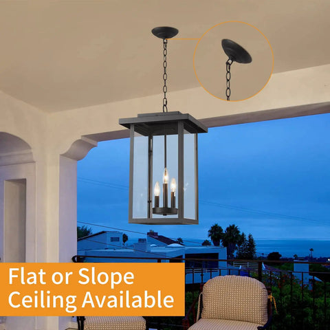 Outdoor Pendant Light Exterior Hanging Lantern In Matte Black With Clear Seeded Glass Large Porch Light lit on patio