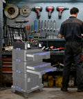 18 Inch Flat Top Tool Box With Stackable Modular System For Garage Storage And Home Repair next to mechanic in workshop
