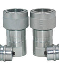 Pair of silver 1/2-inch Pioneer-style ISO 5675 hydraulic quick-connect tractor couplers with knurled collars and dust caps.