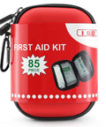 I GO red hard-shell mini first aid kit with zipper and carabiner, 85-piece contents.