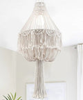 Handmade Macrame Chandelier Plug In Woven Hanging Lamp With On Off Switch 15Ft Hemp Rope Boho Pendant Light featuring intricate tassels in ivory natural cotton cord craftsmanship creating a cozy vibe for bedroom or living room decor.
