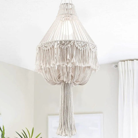 Handmade Macrame Chandelier Plug In Woven Hanging Lamp With On Off Switch 15Ft Hemp Rope Boho Pendant Light featuring intricate tassels in ivory natural cotton cord craftsmanship creating a cozy vibe for bedroom or living room decor.