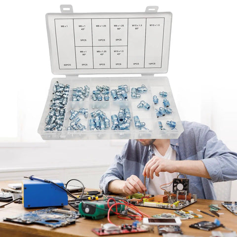 Open box of a 110 Piece Metric Grease Fittings Kit with Standard Straight 45 Degree and 90 Degree Angled Zerk Nipples on workbench.