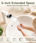 Child using 6-inch extended spout for easy hand washing at bathroom sink featuring flowing water, ideal for toddlers.
