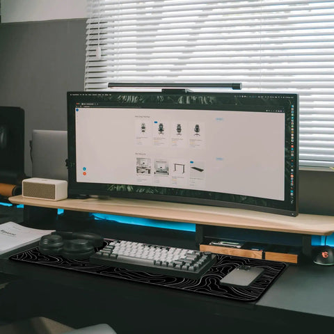 Desktop setup featuring the Beastly 31.5 Inch Long Gaming Mouse Pad With Non Slip Base For Desktop Extra Large Anime Topographic Map Design.