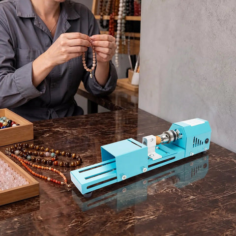 Super Compact Mini Wood Lathe Machine Featuring 96W Motor And Seven Adjustable Speeds Up To 9000Rpm For Precision Turning Punching Engraving Cutting Grinding Polishing Ideal Diy Projects With Lightweight Metal Body And Quick Change Chuck For Easy Setup in use for bead crafting.