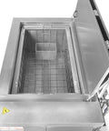 Top Shelf Ultrasonic Parts Washer Uses Rock Solid Three Phase Power To Blast Stubborn Oil Grease And Machining Debris From Metal Tools Providing Consistent Heavy Duty Cleaning For Shop Floors Without Downtime Or Messy Chemicals Killing Your Profit Margins. Stainless steel tank with a mesh basket inside.