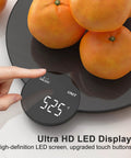 Digital kitchen scale with Precision Food Scale With 1 Gram And 0.1 Ounce Accuracy and HD LED display weighing oranges