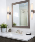 Duo 21 Inch Modern Wall Sconce With Frosted Glass Cylinder Shades in bathroom vanity with brushed nickel finish