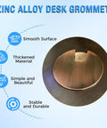 Set Of Two Bronze Desk Grommets Straight Up Sturdy Zinc Alloy Cable Management Covers Smooth Wire Routing Rings For Office Tables close-up view