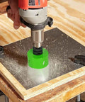 6-1/4 Inch Hole Saw With 6.25 Bit HSS Bi-Metal Cutter drilling into metal on wooden workbench