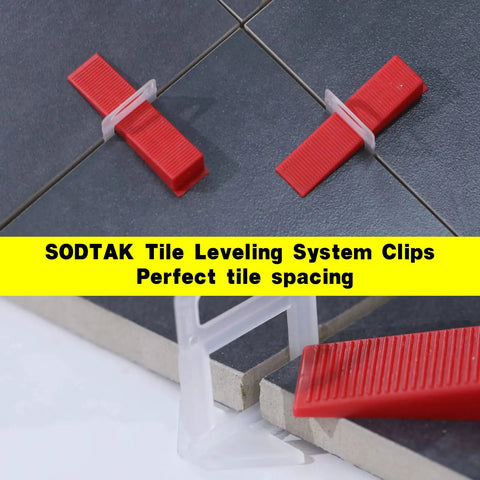 Tile Leveling System With One Sixteenth Inch Spacers And Clips, 2000 Pieces, shown on gray ceramic tile for even grout joints