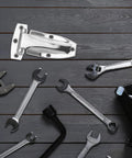 Stainless Steel Truck Door Hinges For Box Trucks And Trailers Heavy Duty visible among various tools on a wooden surface.