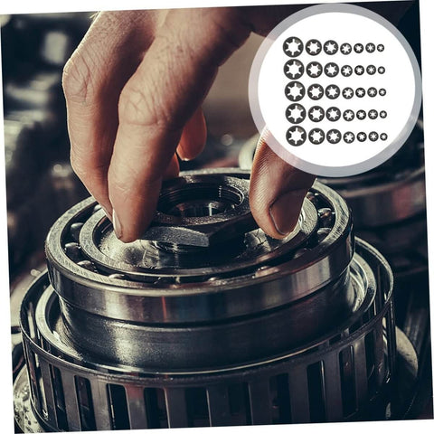 Hand installing 630 Piece Bearing Clip Washer Set With Carbon Steel Locking Washers And Internal Tooth Design For Extra Grip And Stability