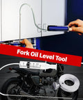 Motorcycle Fork Service Kit With Oil Level Tool and syringe, showing hands using oil fill equipment